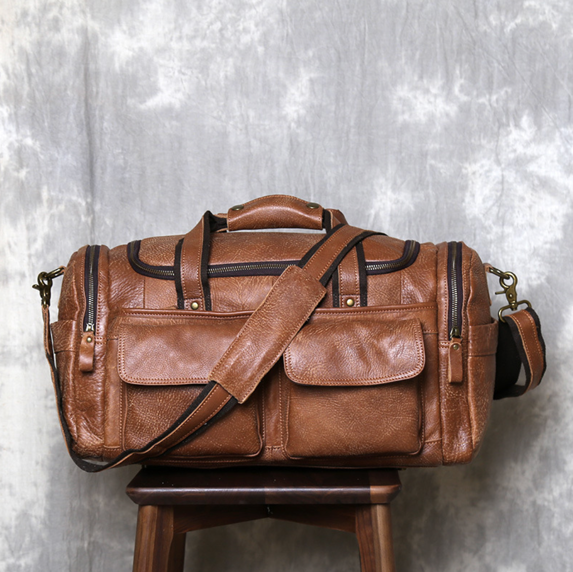 VINTAGE COWHIDE DUFFEL BAG