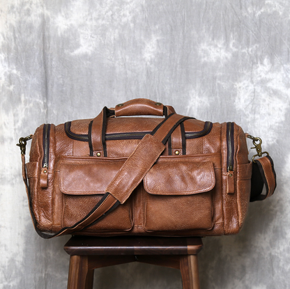 VINTAGE COWHIDE DUFFEL BAG
