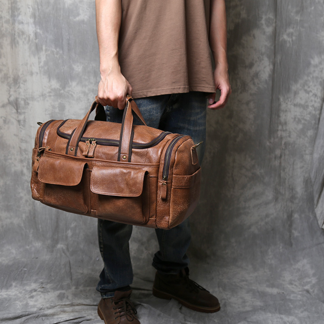 VINTAGE COWHIDE DUFFEL BAG