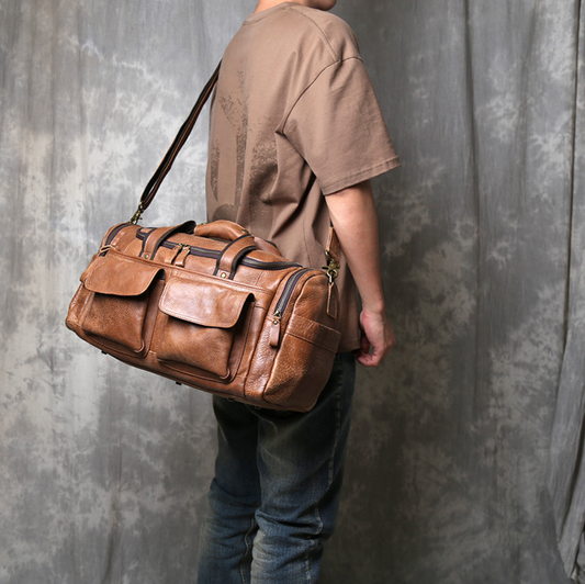 VINTAGE COWHIDE DUFFEL BAG