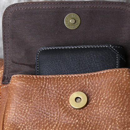 VINTAGE COWHIDE DUFFEL BAG