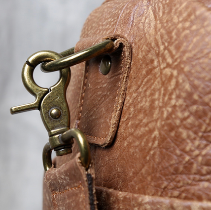 VINTAGE COWHIDE DUFFEL BAG