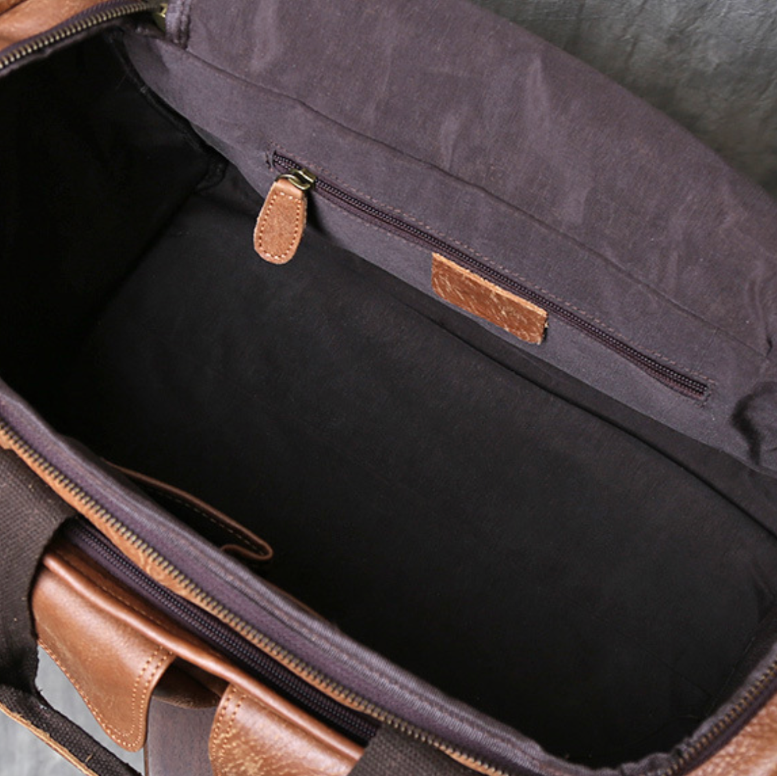 VINTAGE COWHIDE DUFFEL BAG
